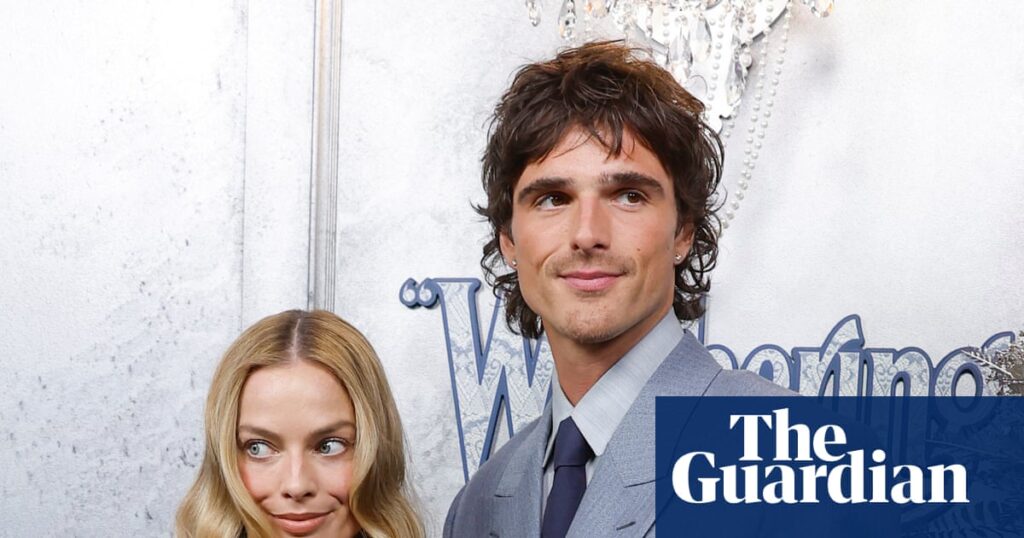 Feathers, lace and Jacob Elordi’s gold tooth: Wuthering Heights premieres in Australia – in pictures - The Guardian