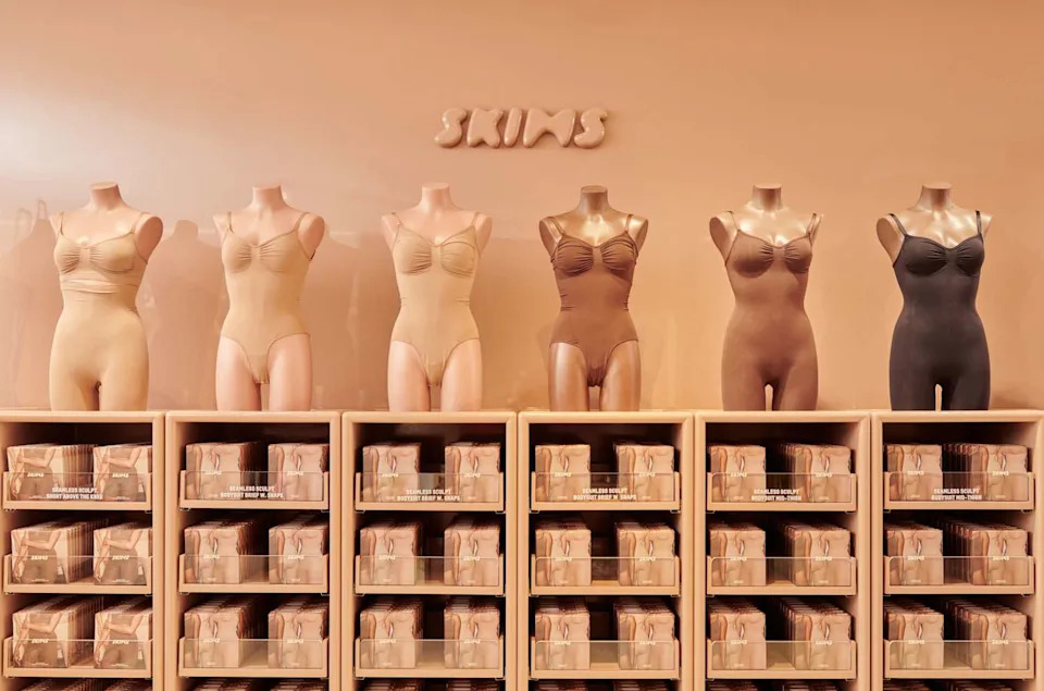 SKIMS has built a mass-market shapewear empire that now faces questions about its large-scale carbon footprint.