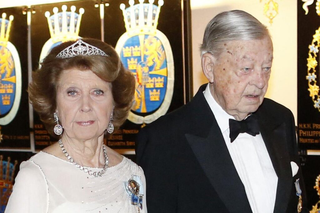 Princess Désirée and her husband, Baron Niclas Silfverschiöld, attend a banquet celebrating the King of Sweden