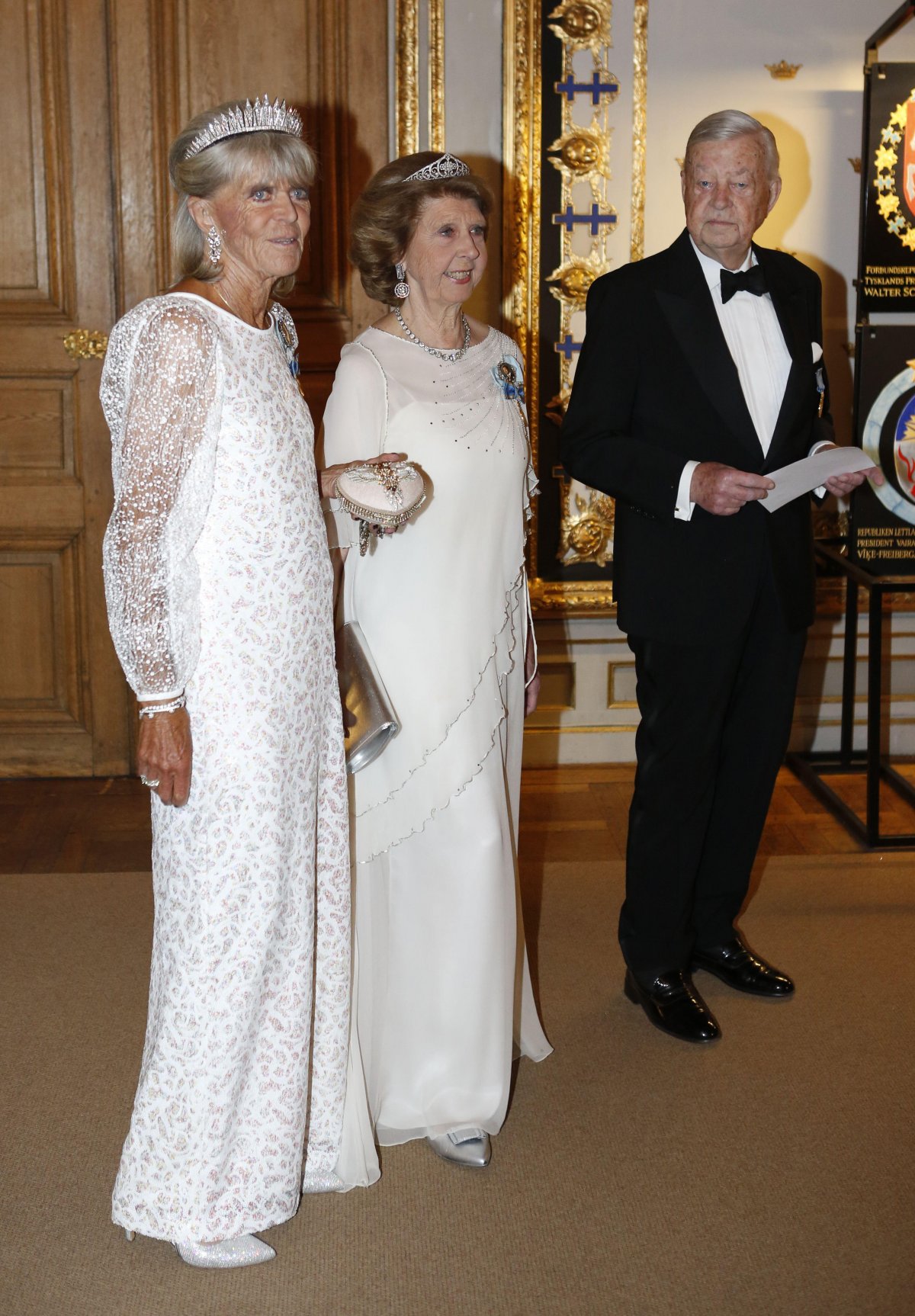 Princess Birgitta, Princess Désirée, and Baron Niclas Silfverschiöld attend a banquet celebrating the King of Sweden's 70th birthday at the Royal Palace in Stockholm on April 30, 2016 (Christine Olsson/TT News Agency/Alamy)