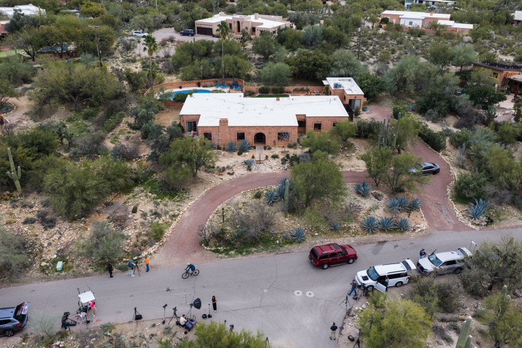 Members of the press work outside the home of Nancy Guthrie, the missing mother of “Today” show host Savannah Guthrie, Thursday, Feb. 5, 2026, in Tucson, Ariz. 