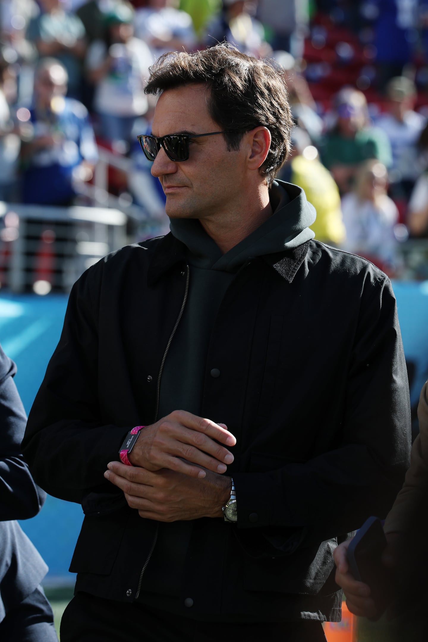 Roger Federer looked on from the field prior to Super Bowl LX between the Seattle Seahawks and the New England Patriots at Levi's Stadium on Sunday in Santa Clara, Calif.