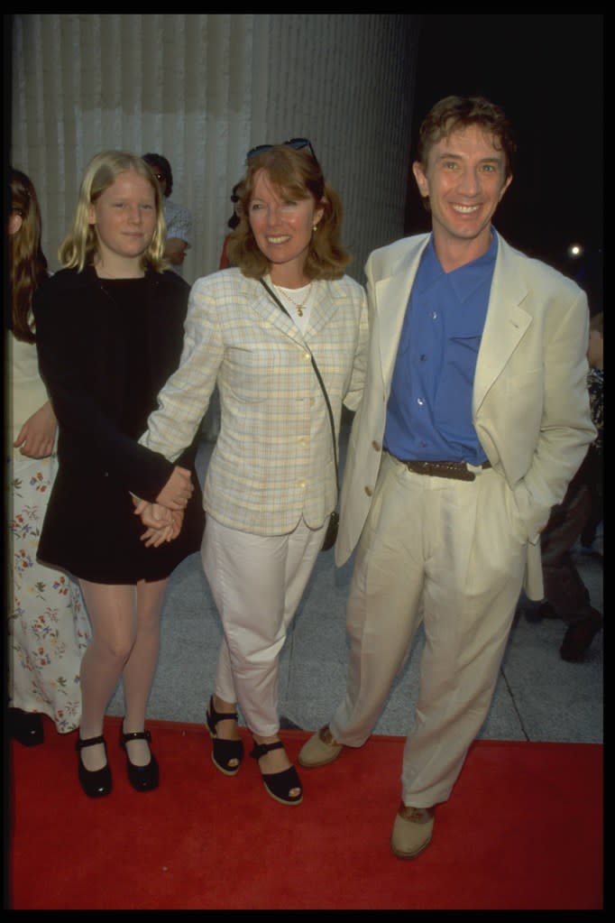 Katherine (seen here with her parents in 1997) was the adopted daughter of Martin and his late wife, Nancy Dolman. Corbis via Getty Images