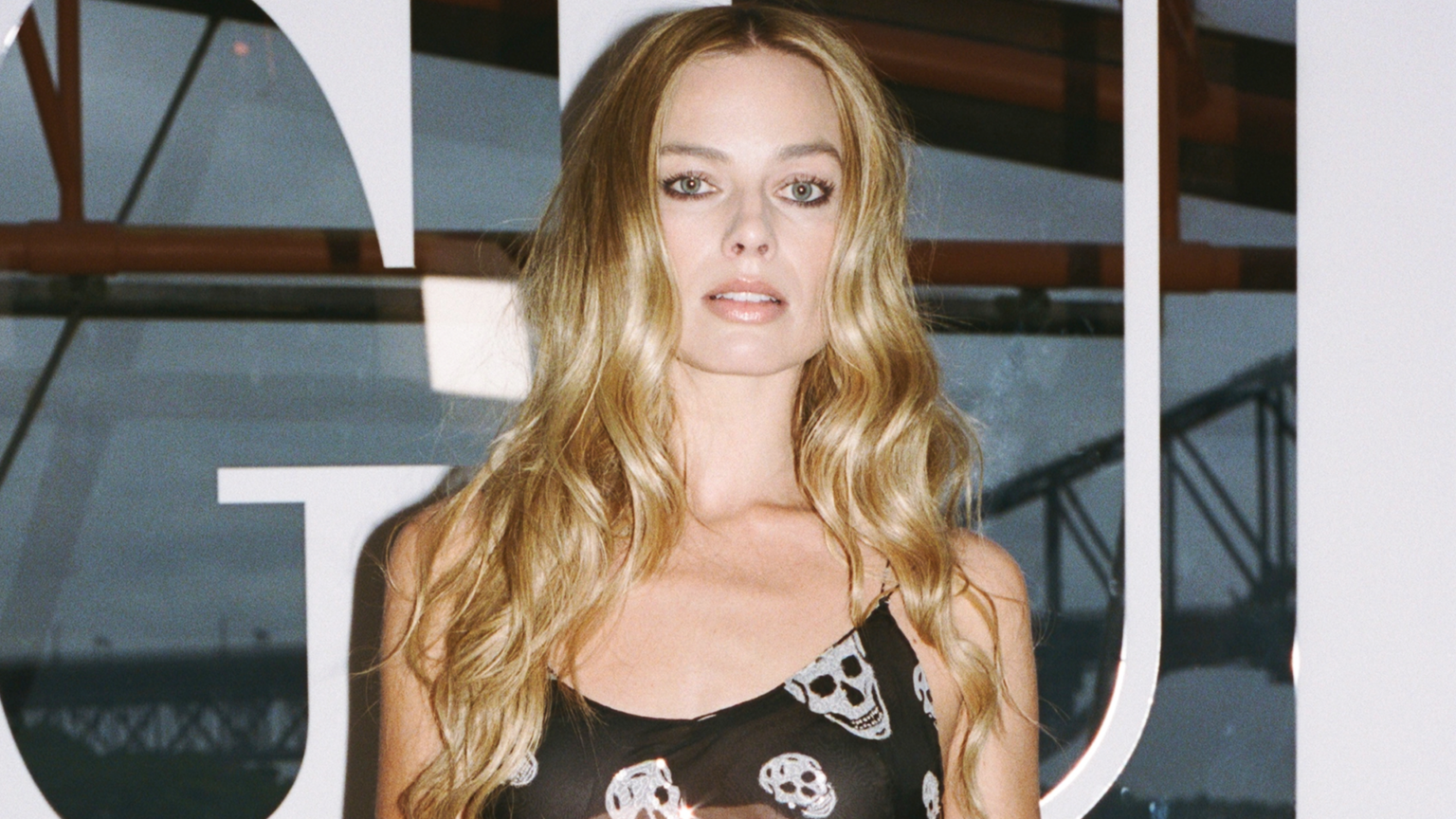 Margot Robbie wore a custom skull scarf-turned-dress from Alexander McQueen in Australia