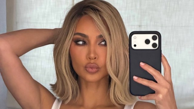 Kim Kardashian Poses in Striking Tank Top Ahead of SKIMS Shoot Yahoo entertainment home