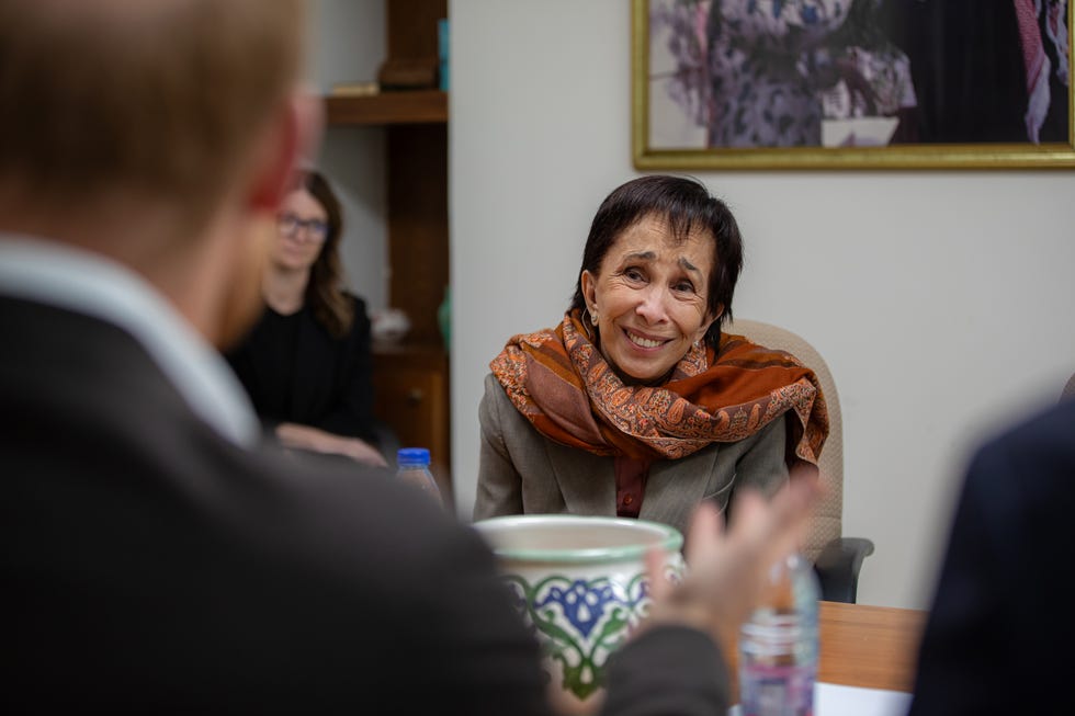 A group discussion in a formal setting.