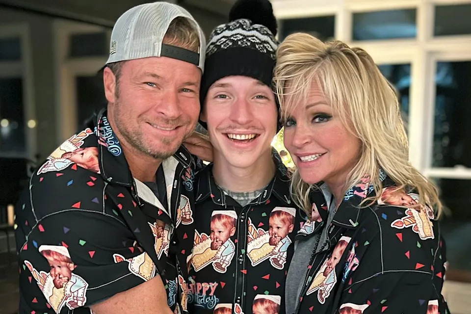 Baylee Littrell smiles with dad Brian Littrell and mom Leighanne Littrell in December 2023. Baylee Littrell/ Instagram