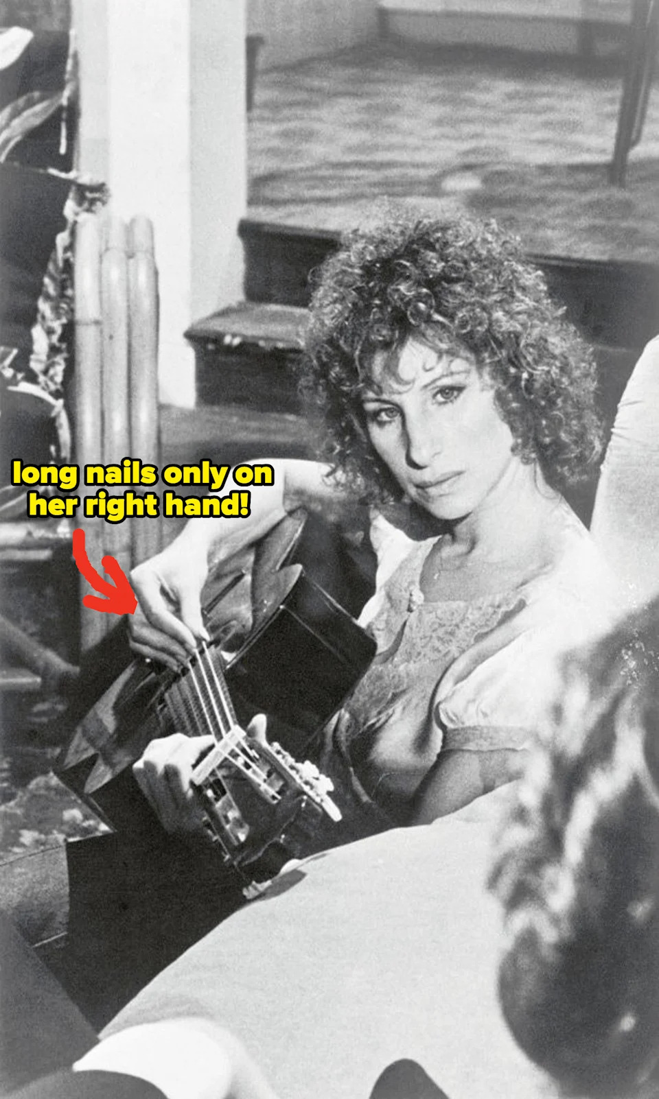 Barbra Streisand playing guitar in "A Star Is Born"