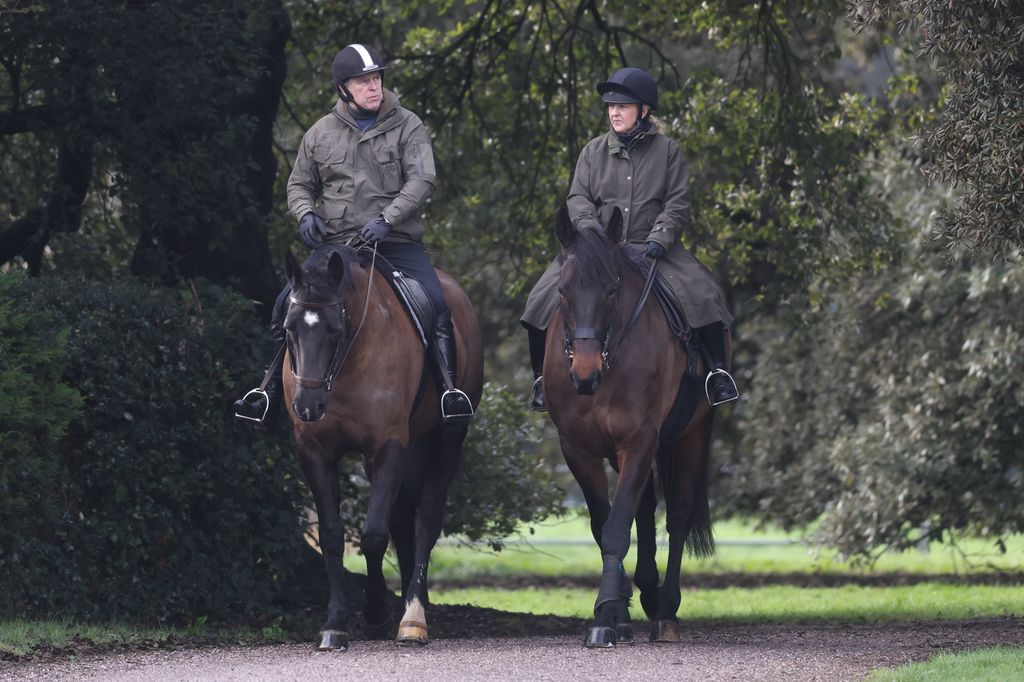 Andrew Mountbatten Windsor riding horse alongside woman riding horse