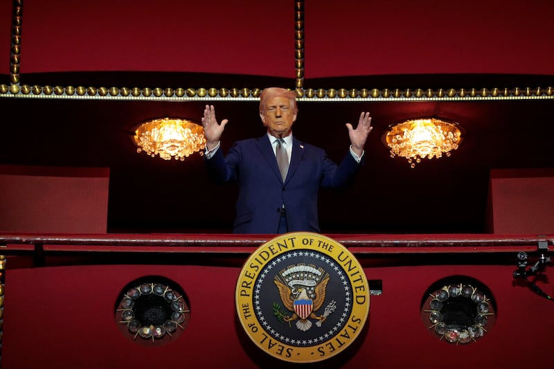 resident Donald Trump looks down from the Presidential Box in the Opera House at the John F. Kennedy Center for the Performing Arts 2025