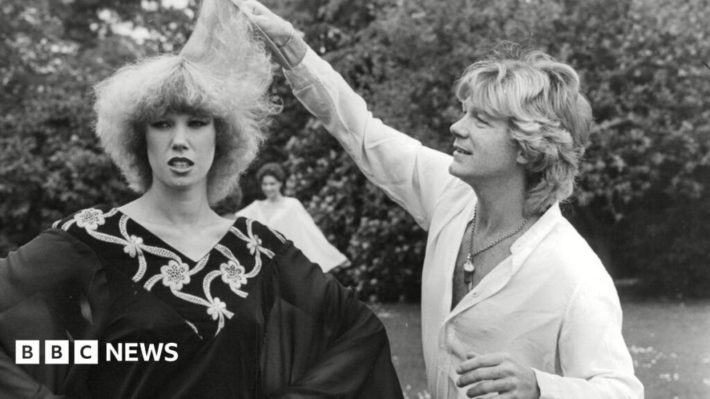 Hairdresser Pierre Alexandre styling the hair of model Lesley Palmer on a photo shoot