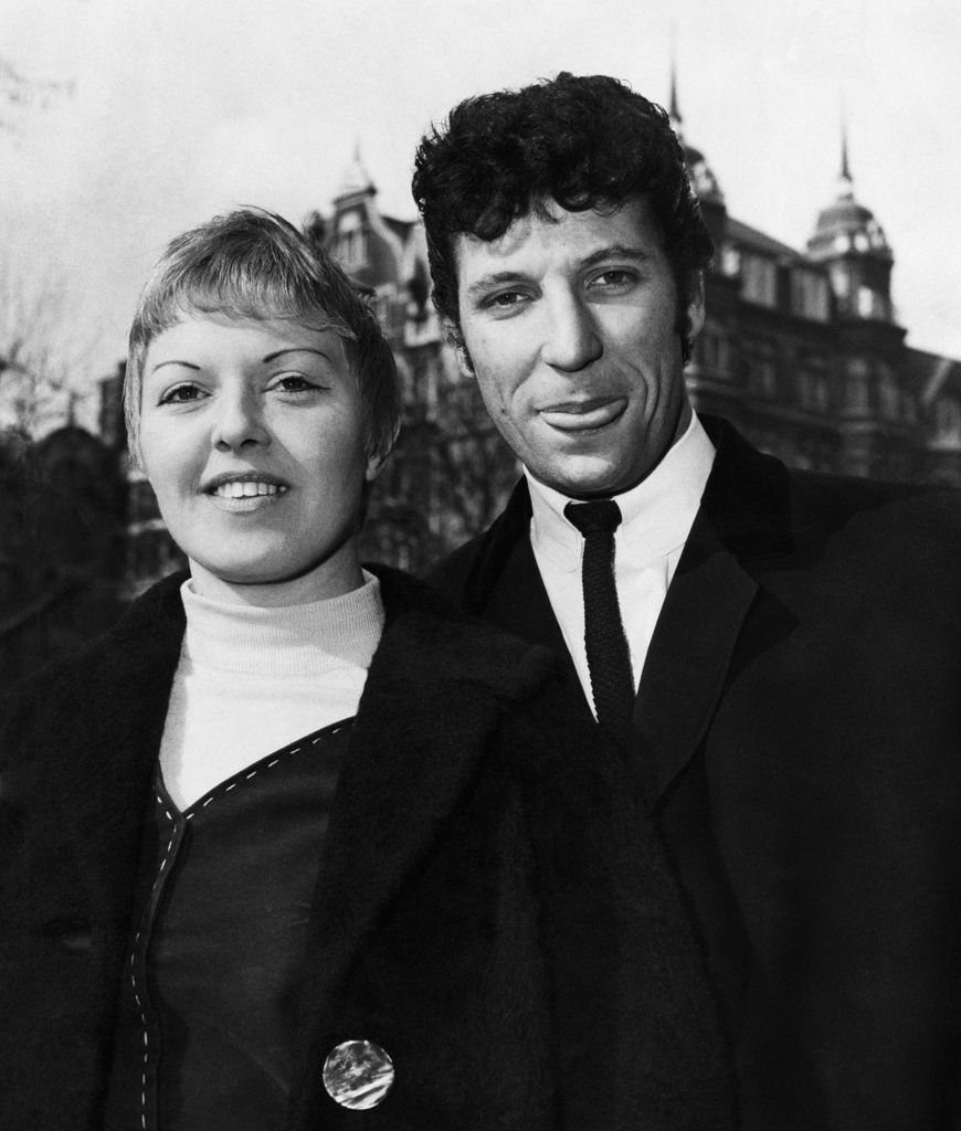 Black and white photo of Tom Jones and wife Linda in London.