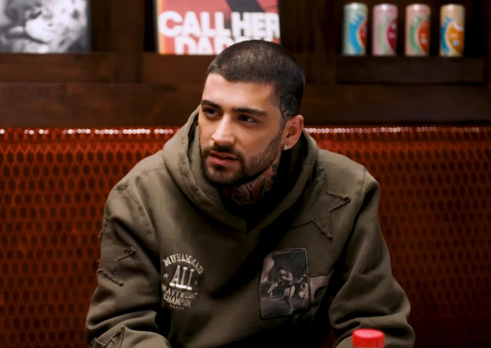 Zayn speaking on a podcast
