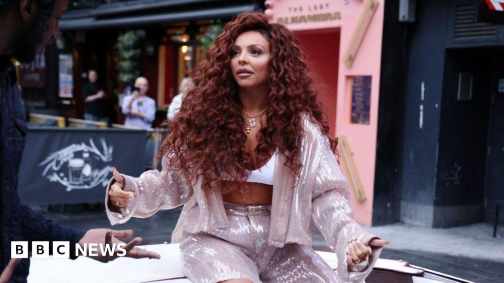 Jesy Nelson in tears as 100,000 sign SMA petition in one day Jesy Nelson in a pink-sequinned top and shorts arrives at Global Radio Studios in Leicester Square