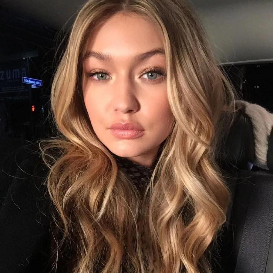 Gigi Hadid is proof that the “careful middle” still gets you dragged. Credit: The Door via Wikimedia Commons.