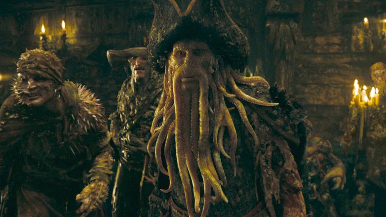 Davey Jones with his crew behind him in Pirates of the Caribbean: At World's End