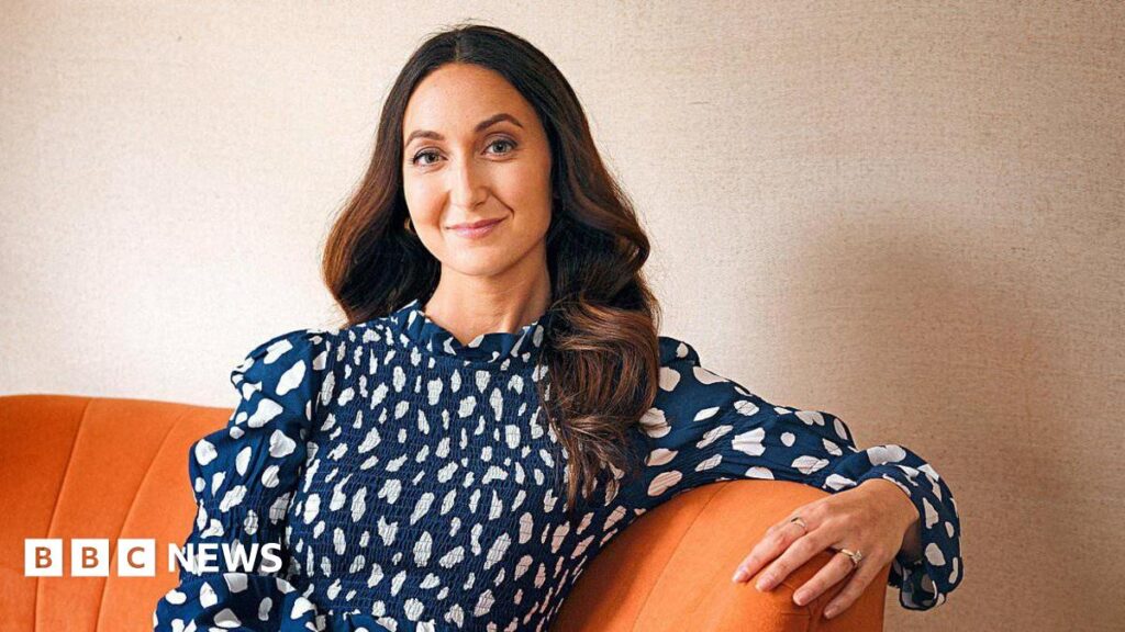 My break-up blindsided me. Here’s how to tell if your relationship isn’t working Eve Simmons, sporting long brown hair and a blue dress, is smiling while sitting on an orange sofa