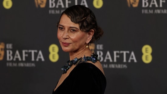 British film executive Donna Langley poses on the red carpet. This look shows how chunky neck pieces can elevate any look with a statement accessory factor.(AFP)