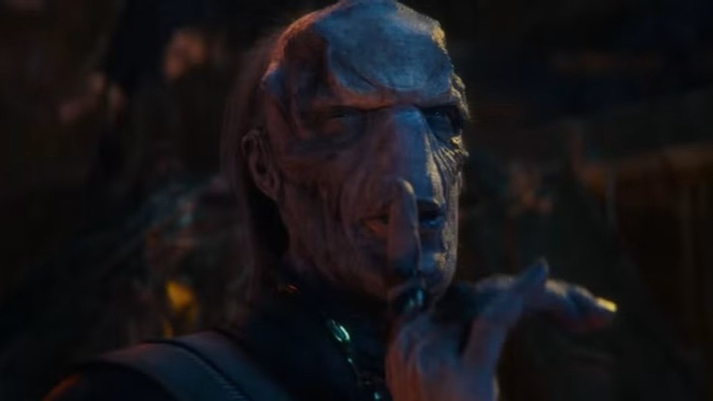 Ebony Maw shushing Doctor Strange with a finger over his lips in Avengers: Infinity War