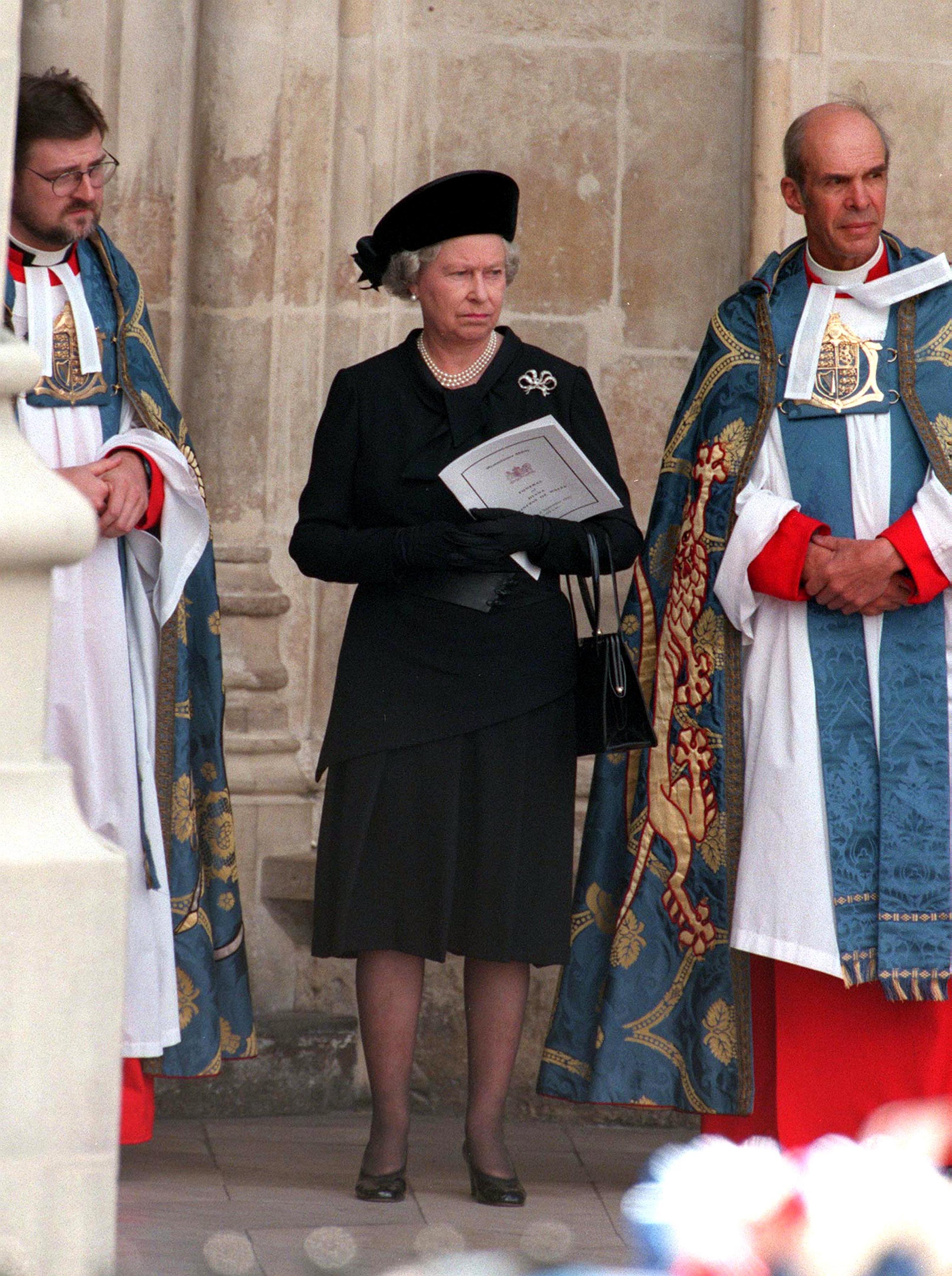 The Queen wearing all black leaving Westminster Abbey after Princess Diana's funeral service, September 6, 1997