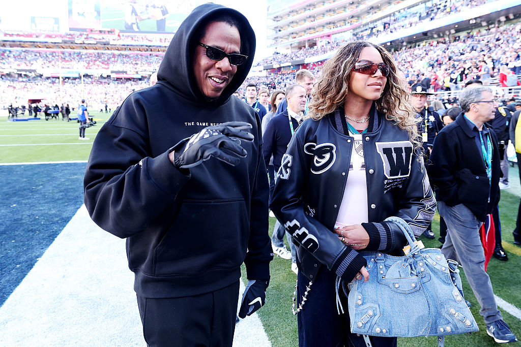 SANTA CLARA, CALIFORNIA - FEBRUARY 08: Jay-Z and daughter Blue Ivy Carter prior to the start of Super Bowl LX between the Seattle Seahawks and the New England Patriots at Levi's Stadium on February 08, 2026 in Santa Clara, California. (Photo by Kevin C. Cox/Getty Images)