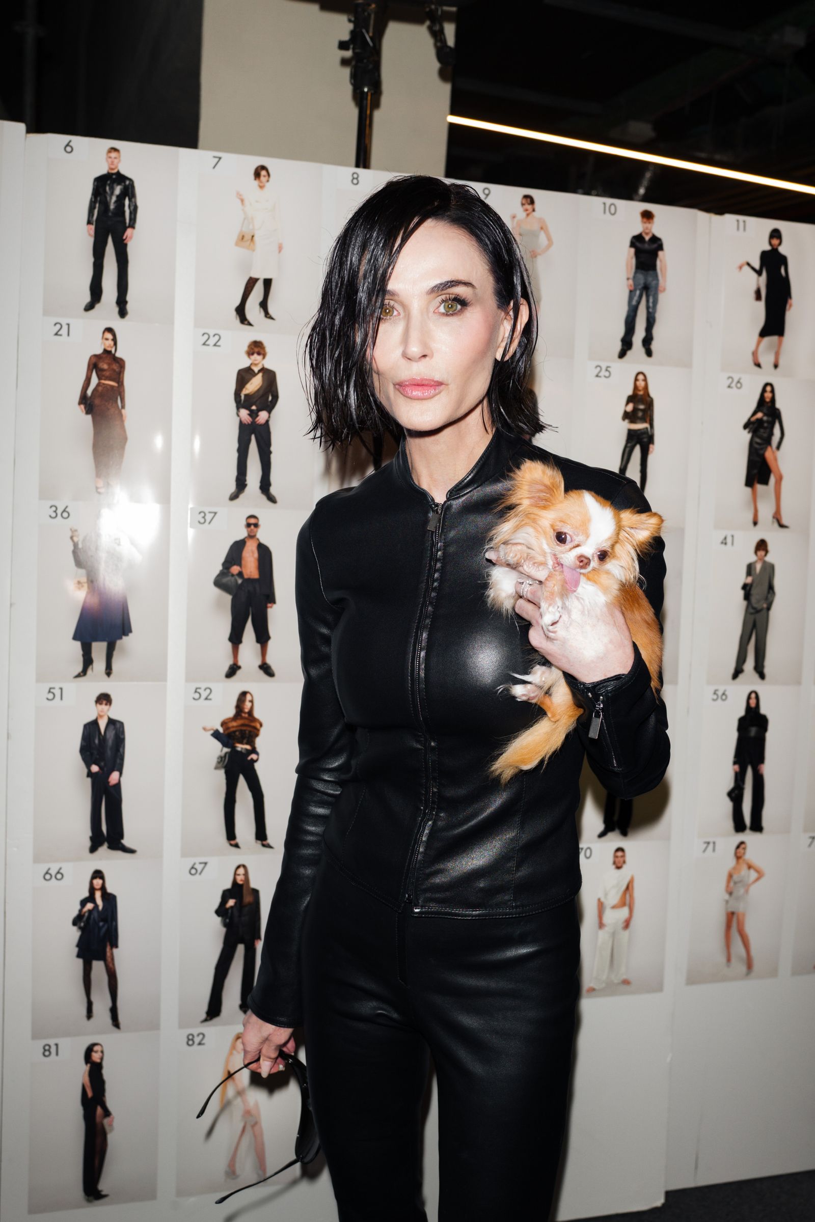 Image may contain Demi Moore Black Hair Hair Person Adult Clothing Coat Jacket Face Head Photography and Portrait