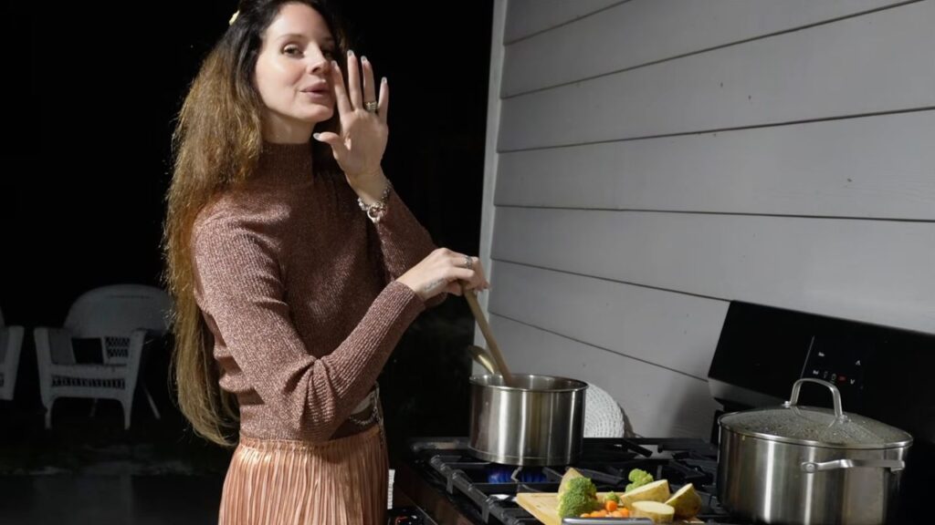 Watch Lana Del Rey Put Her Head in an Oven in “White Feather Hawk Tail Deer Hunter” Video