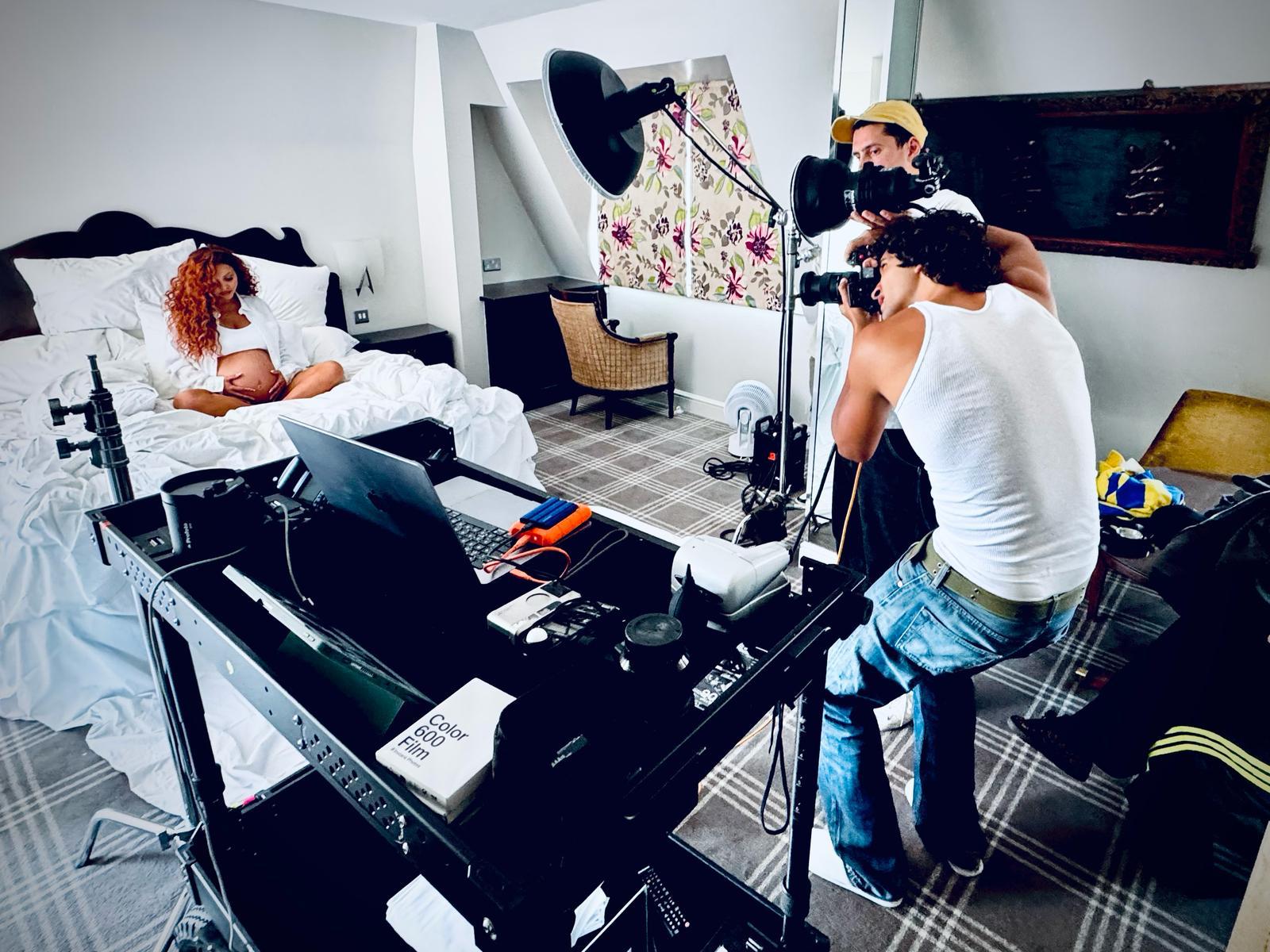 Nelson taking part in a pregnancy shoot at home