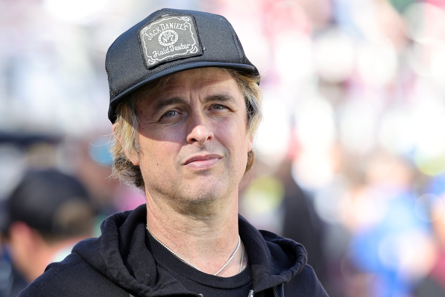Billie Joe Armstrong of Green Day looked on from the field before Super Bowl LX between the Seattle Seahawks and the New England Patriots at Levi's Stadium on Sunday in Santa Clara, Calif. 
