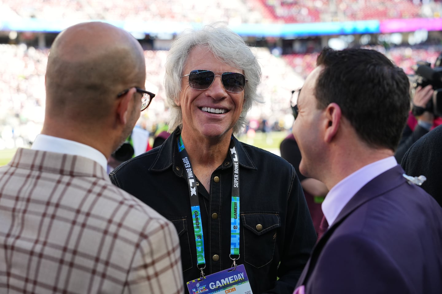 Jon Bon Jovi, center, attended the NFL Super Bowl 60 football game between the Seattle Seahawks and the New England Patriots, Sunday in Santa Clara, Calif.