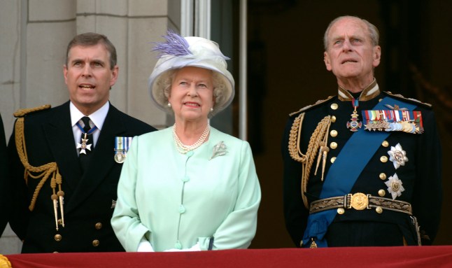Prince Andrew, Duke of York, HM Queen Elizabeth II, The Queen, and Prince Philip, Duke of Edinburgh, watch the flypast over The Mall of British and US World War II aircraft from the Buckingham Palace balcony on National Commemoration Day July 10, 2005 in London. (Photo by Anwar Hussein/Getty Images)