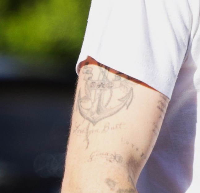 BGUK_3476903 - *PREMIUM-EXCLUSIVE* Los Angeles, MUST CALL FOR PRICING BEFORE USAGE - STRICTLY NOT AVAILABLE FOR ONLINE USAGE UNTIL 22:00 PM UK TIME ON 05/02/2026 - Brooklyn Beckham Debuts New Tattoos in Los Angeles, Covering David Beckham Tribute and Showcasing Nicola Peltz Commitment Amid Family Estrangement Brooklyn Beckham was spotted out in Los Angeles debuting new tattoos, including a dramatic update to his right-arm anchor design where he appears to have covered a tribute to his father, David Beckham, replacing the word ???Dad??? with symbolic markings. The 26-year-old also showed off bold new ink honouring his wife, Nicola Peltz Beckham, with her name written in a heavier font across his hand and surrounded by an all-over cloud motif. The eldest son of David and Victoria Beckham has publicly confirmed he is estranged from his family and does not wish to reconcile. In a candid Instagram post, he accused his parents of attempting to undermine his relationship with Nicola, saying distance has brought him peace and placing privacy and autonomy at the centre of an ongoing high-profile celebrity family feud. Brooklyn was wearing a T-shirt reading ???Good Brother