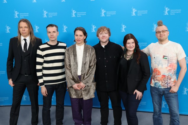 BERLIN, GERMANY - FEBRUARY 14: Eicca Toppinen, Daniel Kuitunen, Seidi Haarla, Rupert Grint, Hanna Bergholm and Ilja Rautsi pose at the 