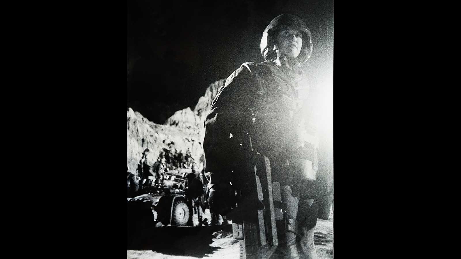 A woman plays a soldier on the planet Klendathu during filming of "Starship Troopers."