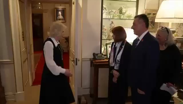 Queen Camilla speaking French with Gisele Pelicot at Clarence House in London