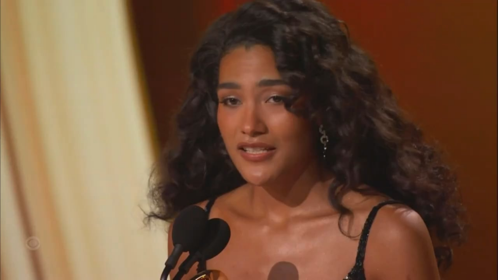 Olivia Dean accepts the Grammy for Best New Artist and says, “I’m a granddaughter of an immigrant": "I am a product of bravery, and those people need to be celebrated."