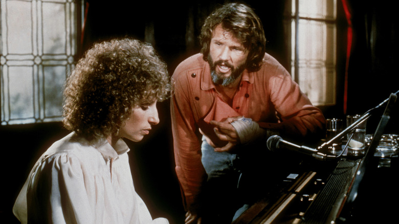 Esther playing piano and John yelling at her in A Star is Born