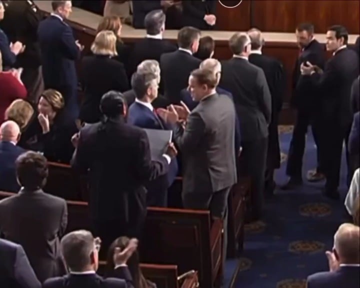 Sen. Mullin, a Republican from Oklahoma, attempted to grab Rep. Al Green’s “Black People Aren’t Apes!” sign as Green held onto it during the 2026 State of the Union.