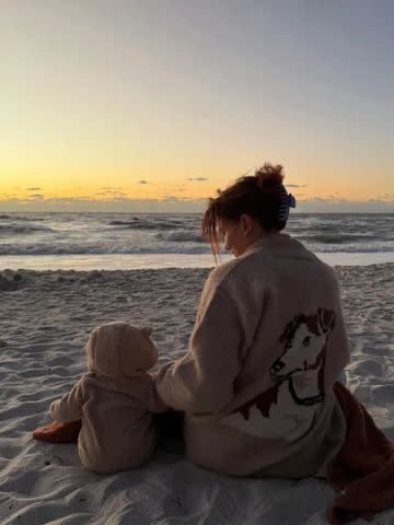 Millie Bobby Brown and her baby daughter in a rare photo of her 22nd birthday Instagram/Millie Bobby Brown