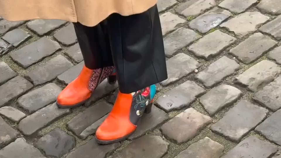 Princess Delphine of Belgium wears funky Texas cowboy boots for a remembrance mass with rest of the royal family