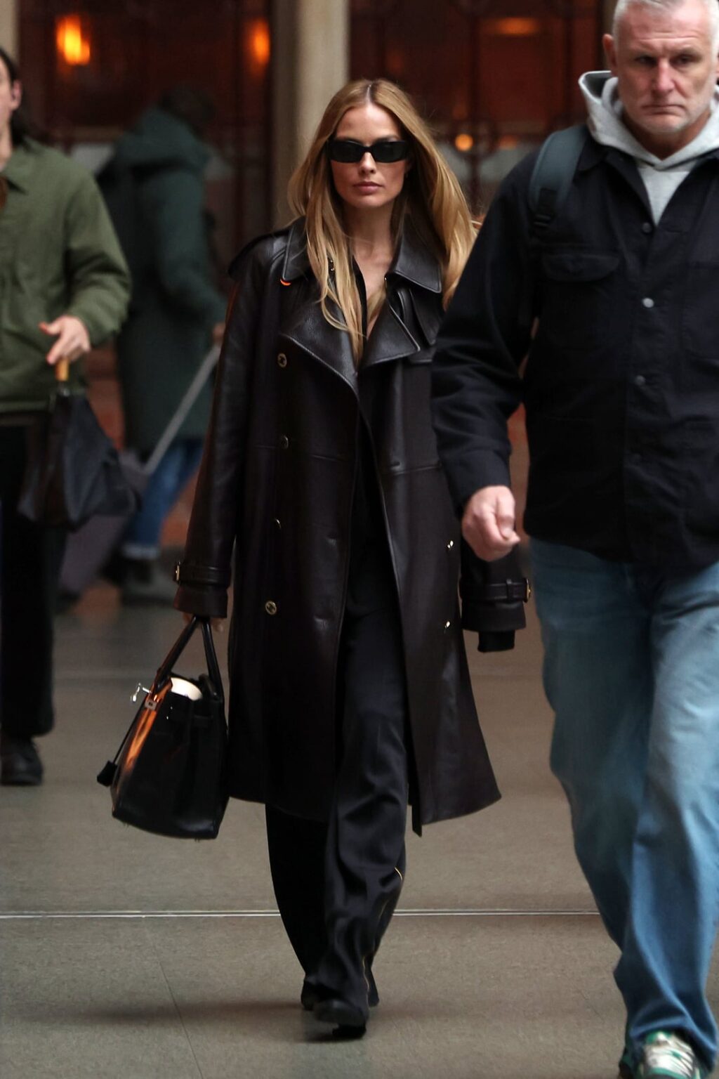 Margot Robbie in Paris in a Chanel Métiers D’art 2026 Coat [February 3, 2026]