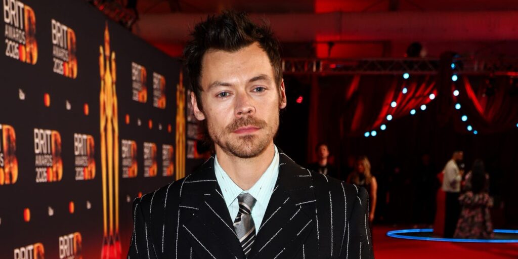 Harry Styles Wears Chanel Pinstripe Suit to the BRIT Awards