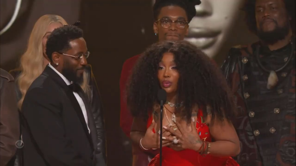 SZA accepting her Grammy for Record of the Year: "Please don’t fall into despair. I know that right now is a scary time. We can go on—we need each other. We are not governed by the government; we’re governed by God."