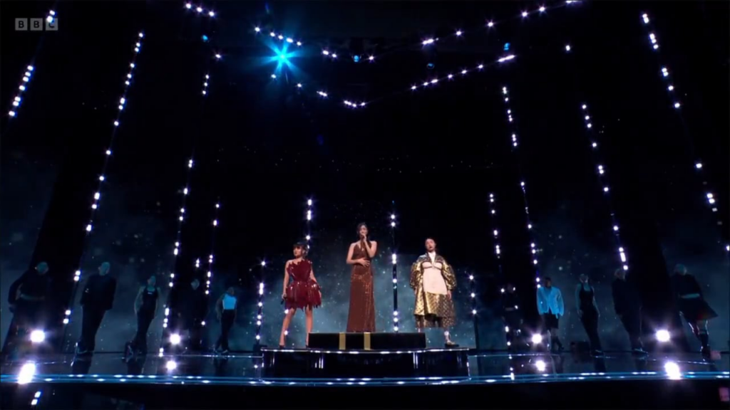 Ejae, Rei Ami, and Audrey Nuna perform "Golden" at the BAFTAs