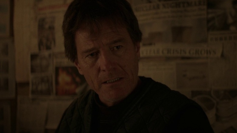 Joe Brody in front of a bunch of newspapers in 2014's Godzilla