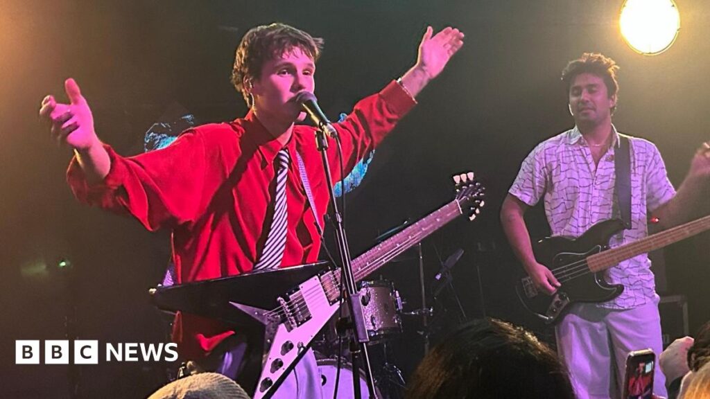 Cruz Beckham launches music career, having fun amid family drama Cruz Beckham on stage