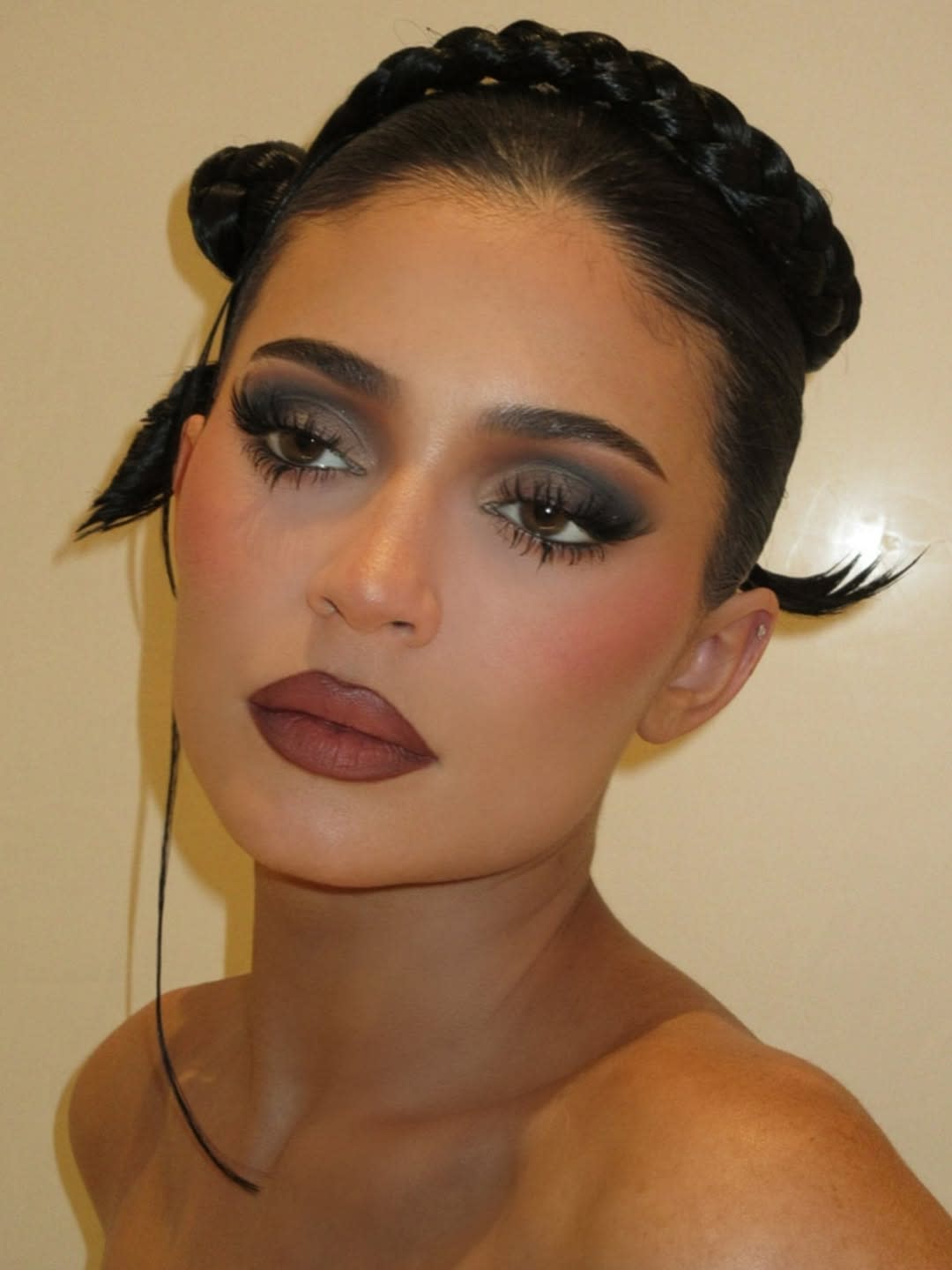 woman with dark eye makeup