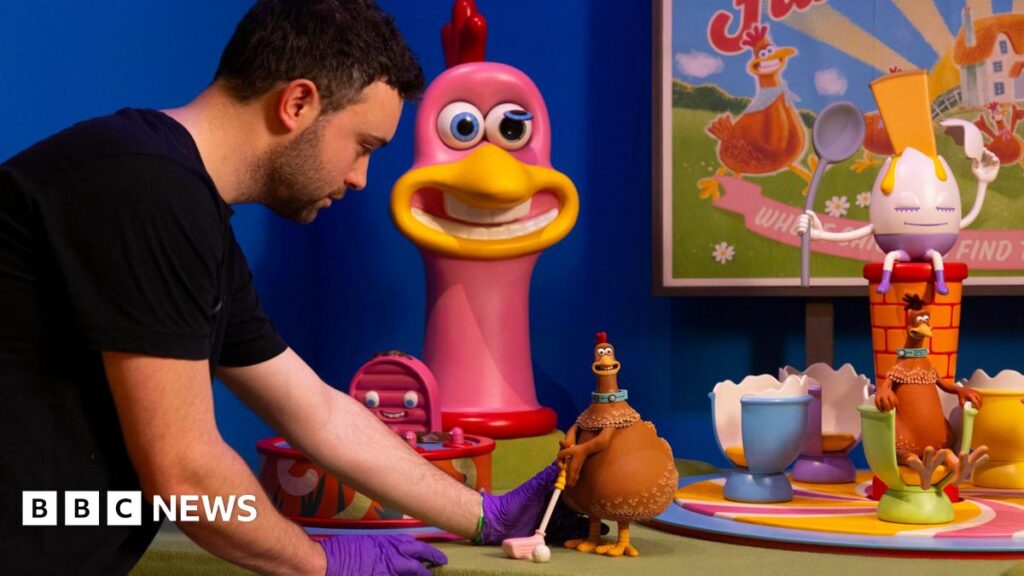 A man setting up a Chicken Run installation