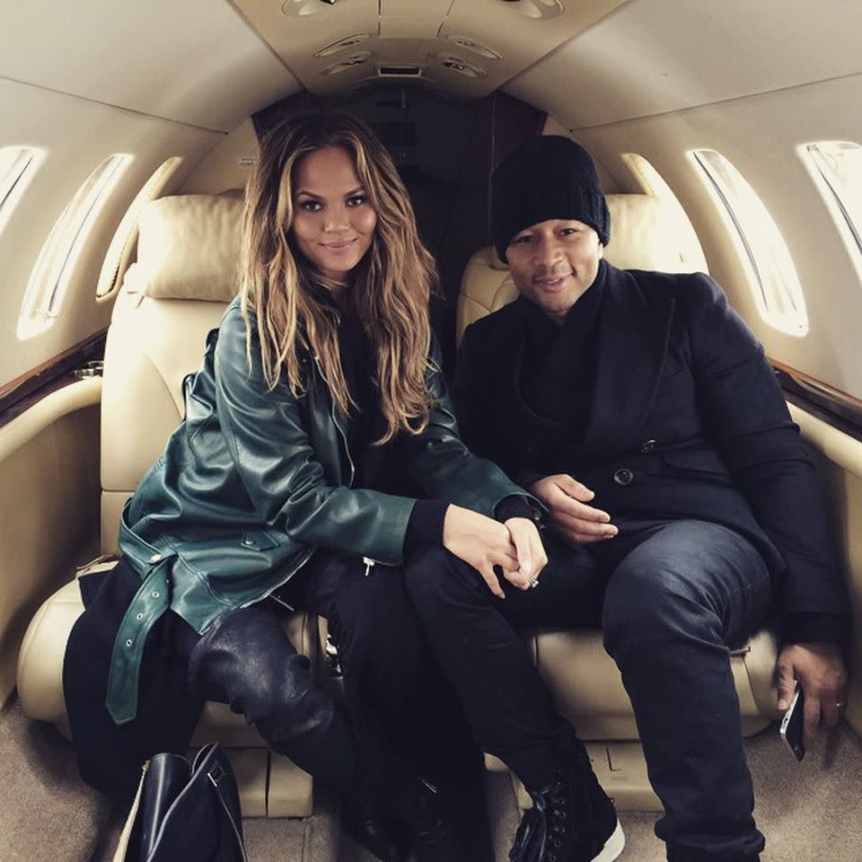 Chrissy Teigen and John Legend aboard a private jet in February 2015 Chrissy Teigen Instagram