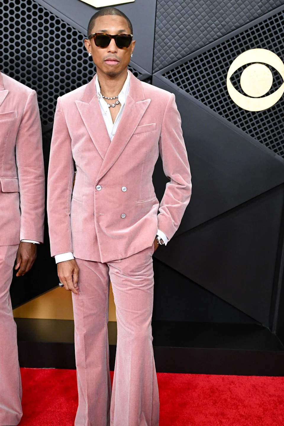 Pharrell Williams in a pink suit
